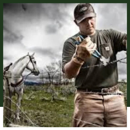 Clothing & BootsA farm hand installing a wire fence.